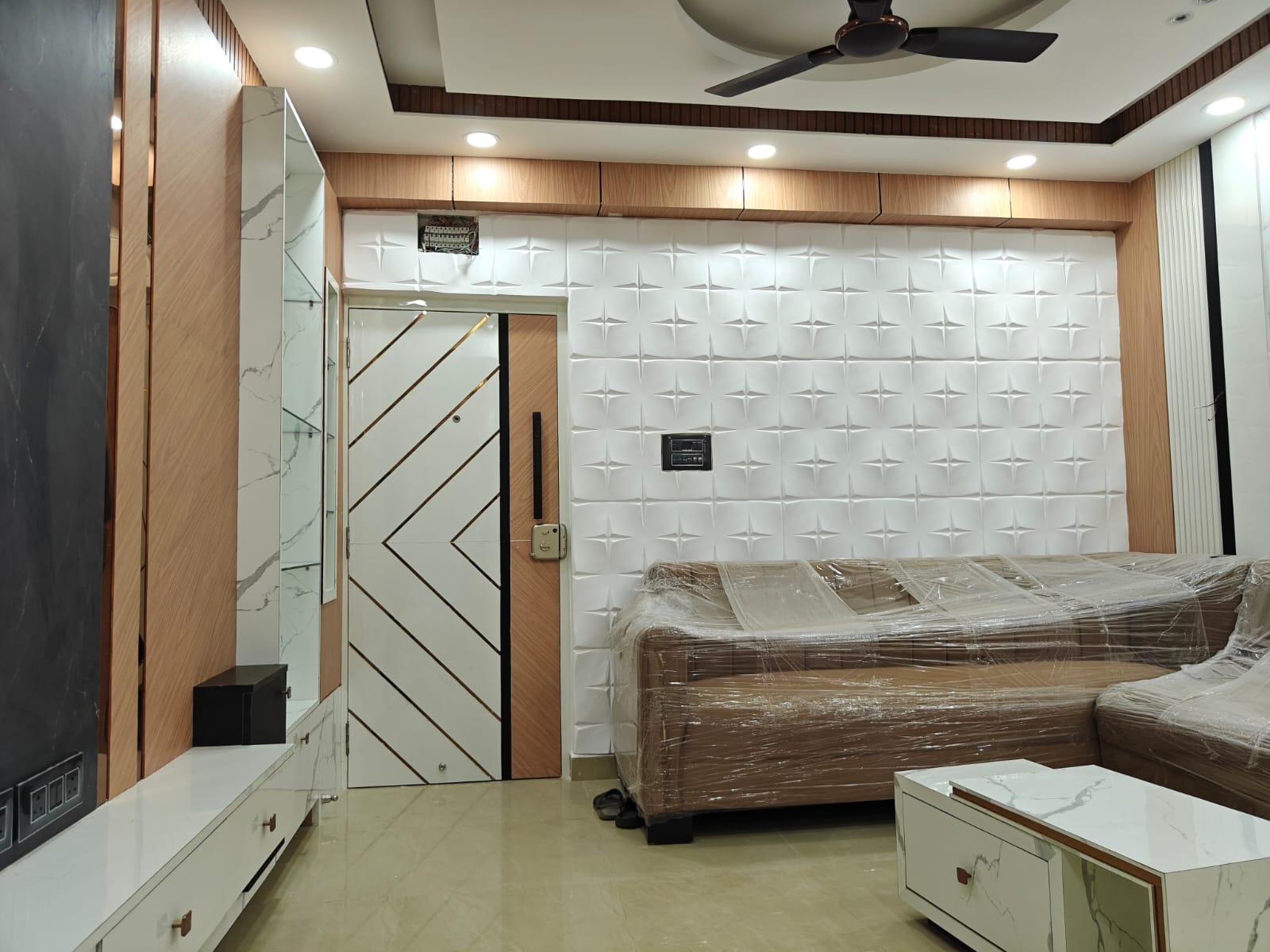 Living room feature wall and sofa layout