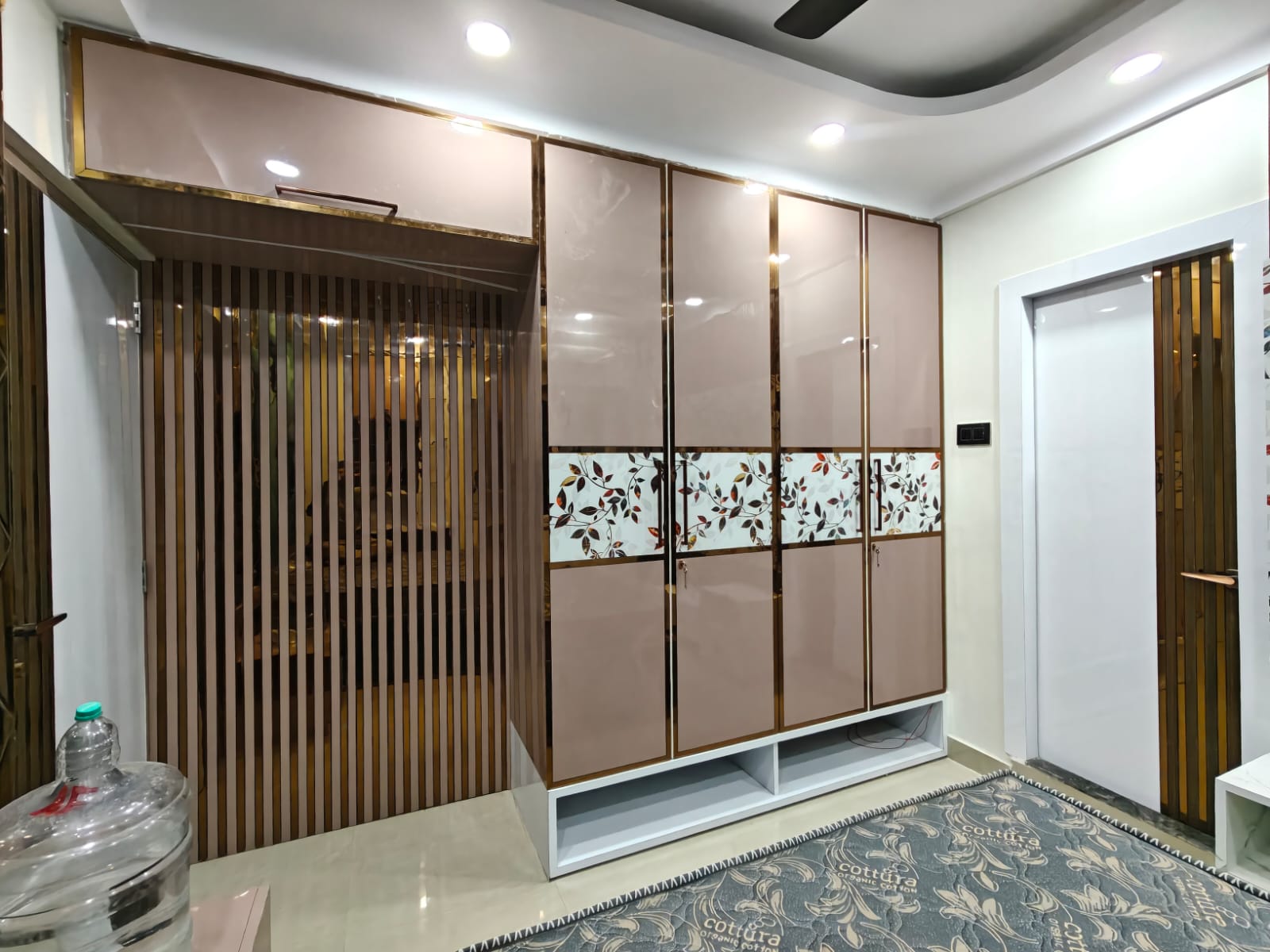 Bedroom wardrobe with decorative floral shutter design